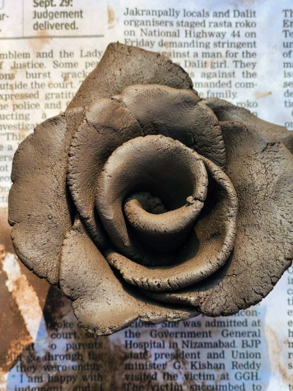rose made of clay in pottery class